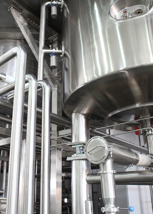 Dairy processing plant with stainless tanks and pasteurizing equipment