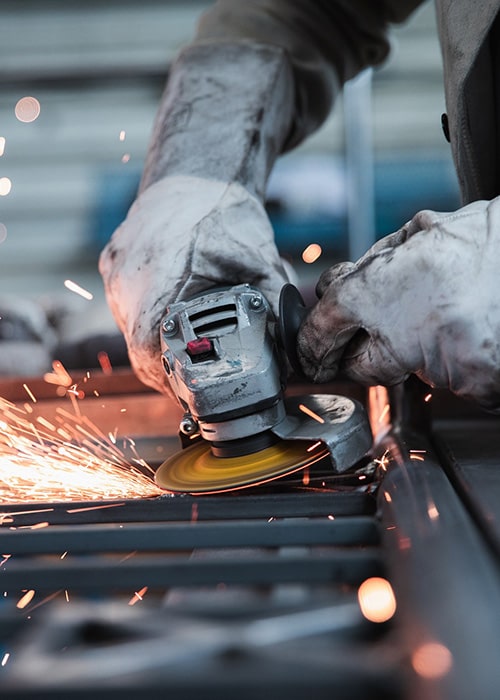 Metal finishing shop with process tanks and handling equipment