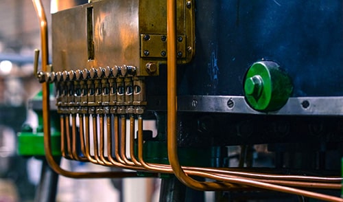Brazed plate heat exchanger connections and circuit manifold